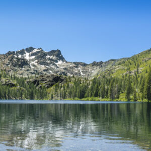 The Sierra buttes behind lower sardine lake panoramic view.